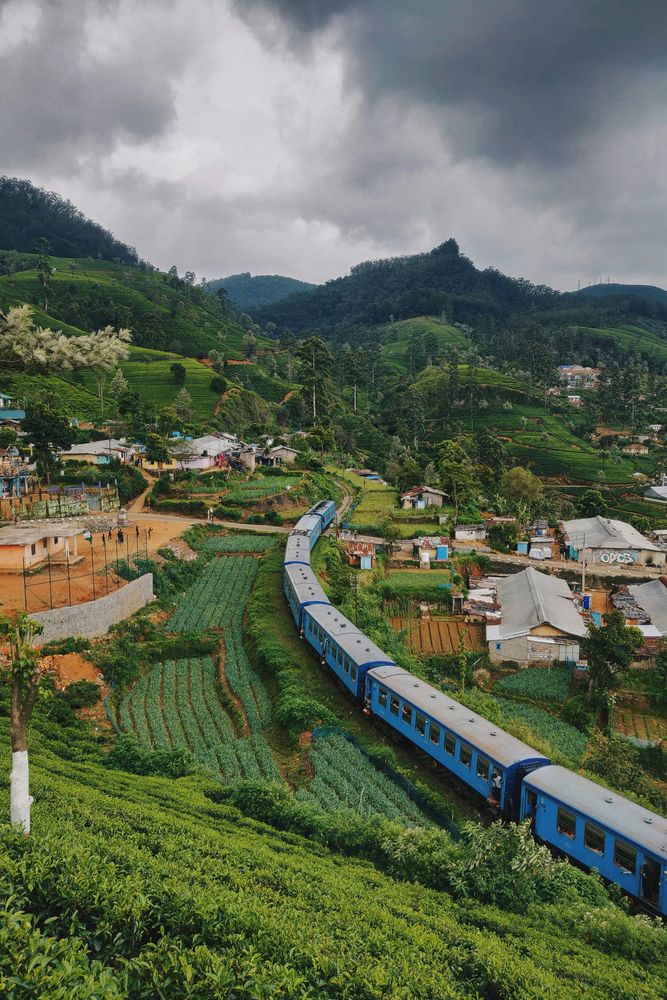 Scenic train winding through Sri Lanka's hill country